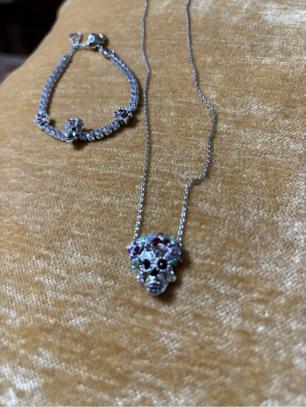 Origami Owl Day of the Dead Silver Skull necklace and bracelet.